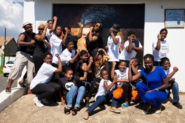 Our Strong Girls hanging out with the brilliant musicians from the 'Strong Girl' song! Photo Credit: Mike Turner Photography